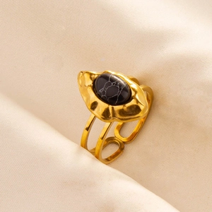 Detail showing the hammered texture and black marble stone on this vintage open ring