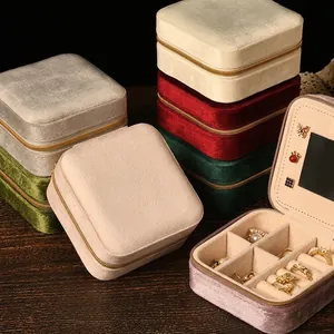 Portable velvet jewelry storage box with mirror and zipper closure in various colors