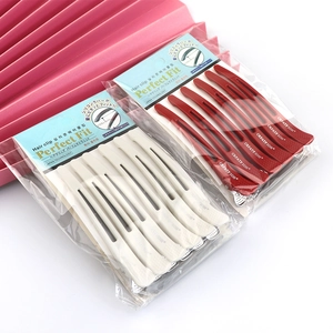 Set of 12 professional red and white duckbill hair clips for styling and sectioning