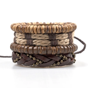 Retro multi-layer brown leather and coconut shell bead bracelet set on white background