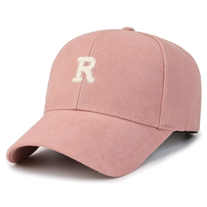 Pink baseball cap with embroidered letter R and curved brim for outdoor sports