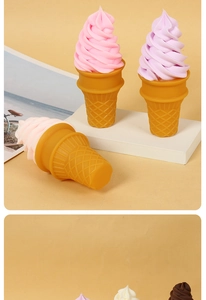 Macro detail of various pastel artificial ice cream cones on a geometric display