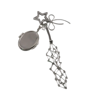 Silver star-shaped metal lipstick pouch charm with bow and mirror detail for handbags