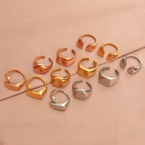 Polished heart and geometric open rings in gold, silver, and rose gold finishes