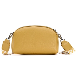 Yellow half-moon crossbody bag with litchi grain texture and wide geometric strap
