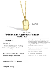 Close-up of gold plated square pendant with letter J and sparkling zircon border