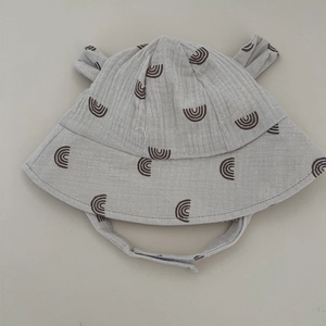 Cute baby bucket hat made of soft cotton gauze with rabbit ears and rainbow print design