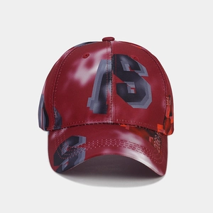 Detail of burgundy baseball cap featuring grey digital 18 print and street style embroidery