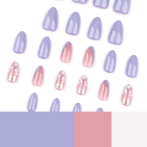 Purple and pink press-on nails set with white floral designs and French silver tips