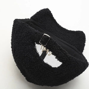 Rear view of a black fuzzy sherpa baseball cap featuring an adjustable metal buckle