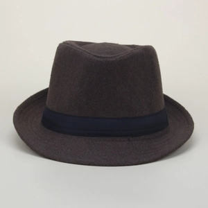 Detail of wool fedora hat texture with dark blue ribbon band and rolled brim