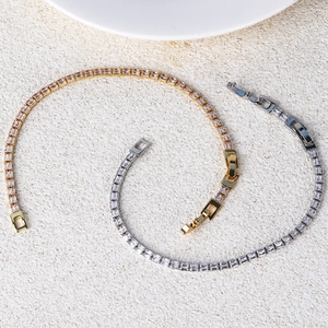 Double-row tennis bracelet with sparkling rectangular zircons in gold and silver finish