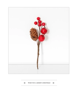 Detailed close-up of festive red berries and pine cone branch for Christmas decor