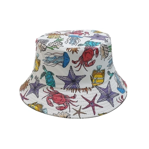 White bucket hat with colorful sea life print including crabs, jellyfish and sea turtles