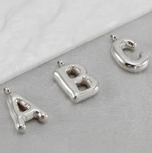 Modern puffy balloon style silver alphabet pendant set A B C in polished stainless steel