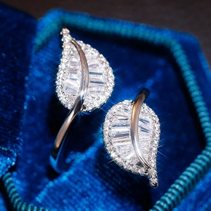 Elegant silver leaf open ring featuring sparkling clear cubic zirconia on velvet base