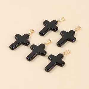 5-piece set of polished black cross pendants with gold-plated bails for DIY jewelry making