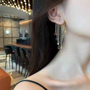 Elegant gold star tassel drop earrings with sparkling crystals for a sophisticated look