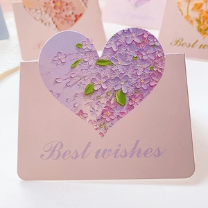 Macro shot of 3D oil painting flower pattern inside heart-shaped cutout card