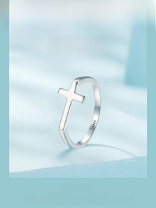Macro shot of 925 sterling silver cross ring band showing smooth inner texture and quality mark