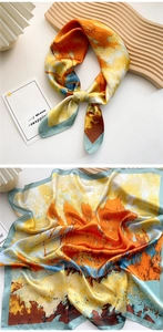 Detail of artistic oil painting style silk scarf with vibrant orange and yellow patterns