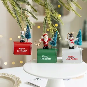 Festive Christmas mailbox ornaments with snowman and Santa figures for tree hanging