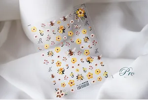 Detail of 5D floral embroidery nail stickers with yellow daisies and bees style TS-112