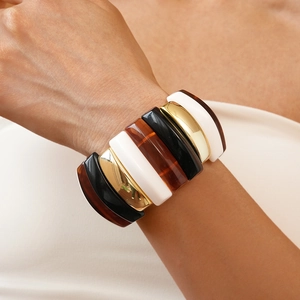 Irregular multicolor chunky acrylic cuff bracelet with gold-tone metal and tortoiseshell accents