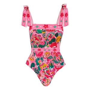 Détail d'un maillot de bain fleuri rose avec d'élégantes bretelles à nœuds papillon