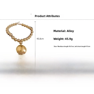 Detail of gold beaded necklace with large pebble pendant showing 45.8cm total length size