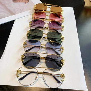 Aviator sunglasses with leopard head carving and gradient lenses in multiple colors