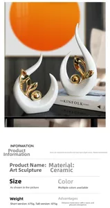 Detailed macro view of luxury ceramic art ornaments with golden leaf accents and white glaze