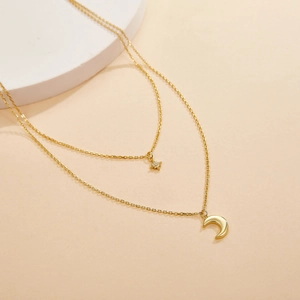 Elegant gold S925 sterling silver double-layer necklace with star and moon charms