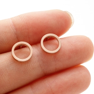 Minimalist 18K rose gold plated round hoop earrings with a polished geometric design