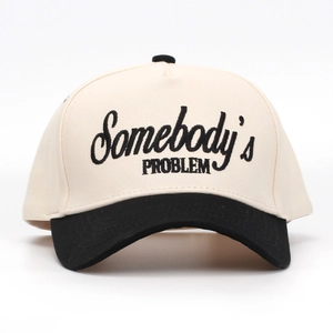 Detail of cotton baseball cap featuring Somebody's Problem embroidery and contrast brim