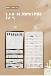 Dual-sided hanging jewelry organizer with 80 pockets and hooks for necklaces and bracelets