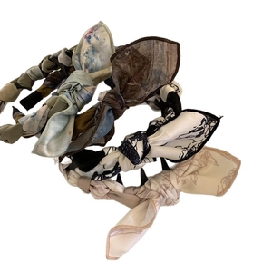 Artistic acrylic fabric bow headbands with floral prints for high skull top hairstyle