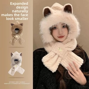 Detail of soft faux fur winter hood with cute animal ears and plush scarf closure