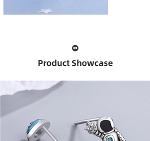 Macro view showing the silver astronaut stud earring with blue star and black enamel