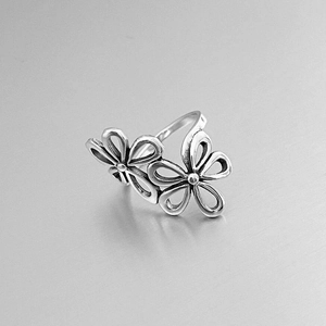 Minimalist silver hollow flower open ring featuring dual floral pattern for women