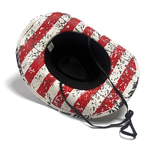 Detailed top view of a woven straw cowboy hat featuring a vintage American flag pattern