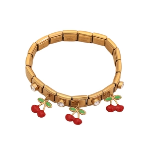 Gold stainless steel stretch bracelet with red enamel cherry charms and zircon stones
