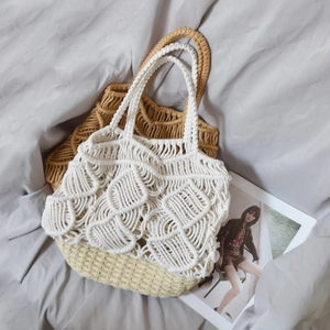 Handwoven straw bucket bag in cream and khaki with cotton rope mesh design