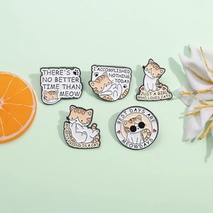Set of five cute cartoon cat enamel pins with funny quotes on a fresh green background