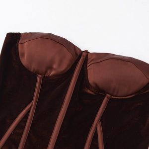 Brown velvet and satin corset top featuring structured bone support and luxury knit fabric