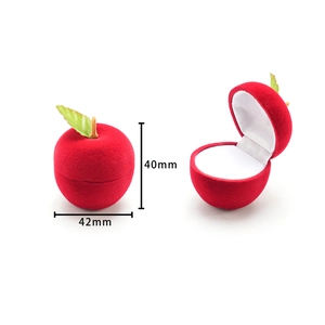 Red apple-shaped velvet jewelry box showing open and closed views with dimensions