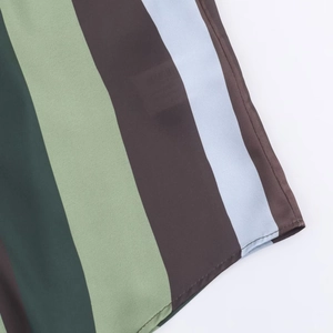 Macro view of vertical multi-colored stripes on smooth satin texture woven fabric