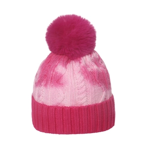 Pink gradient knit beanie with large faux fur pom-pom and cable stitch texture