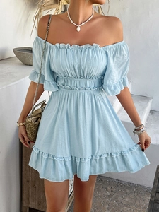 Detail of light blue off-shoulder dress with ruffle trim and elastic pleated waist