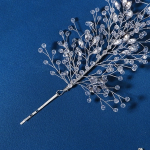 Detailed view of silver crystal branch headband with rhinestones for wedding hair accessories